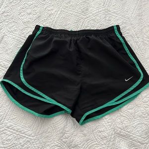 Black and green Nike shorts